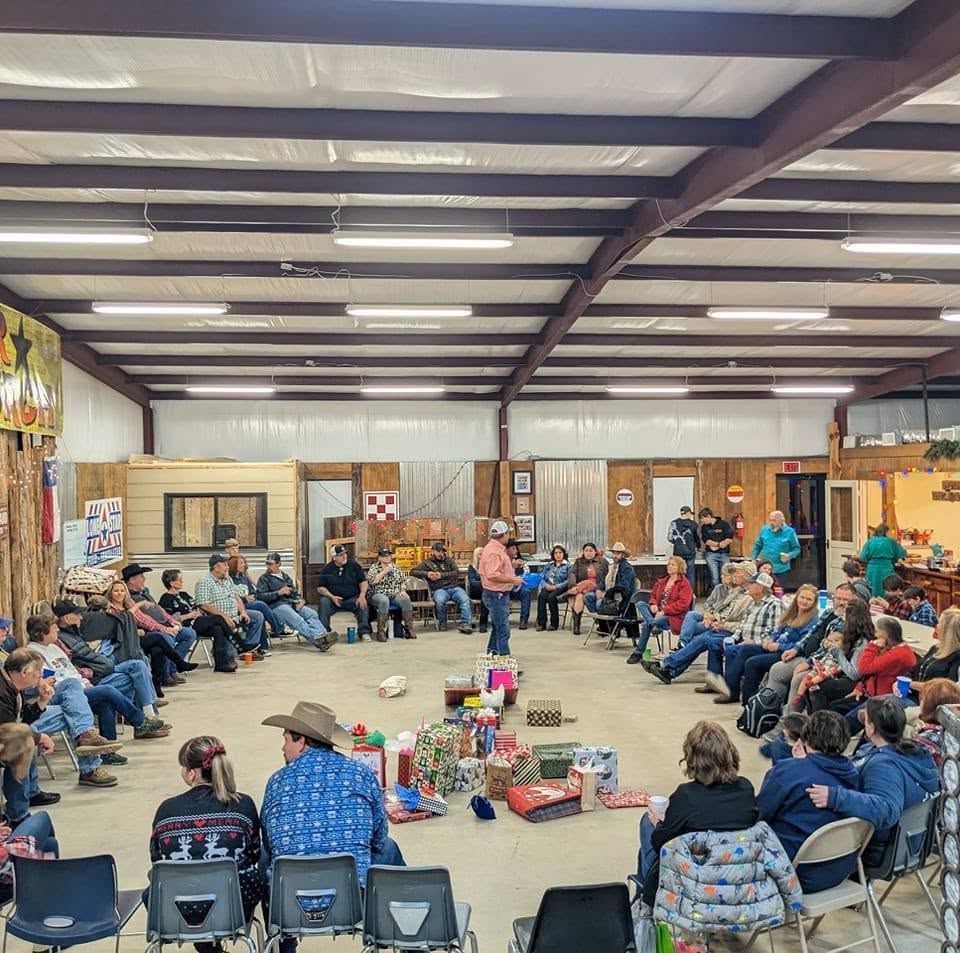 Congregation gathered in a circle at a Christmas get-together